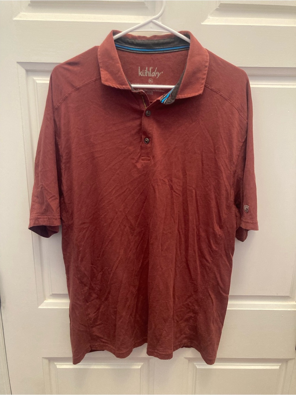 Kuhl Men's Polo in Burnt Orange with Blue Trim